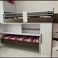 تخت خواب دو طبقه همراه با کمد رخت آویز ومیزتحریر