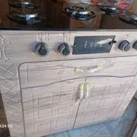 اجاق گازرومیزی و طرح فرکابینتی و هود