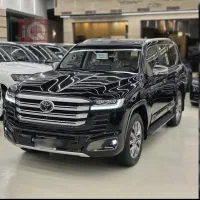 تویوتا لندکروزر VX HEV هیبرید پلاک ملی