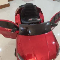 ماشین شارژی bmw قرمز متالیک دو موتوره