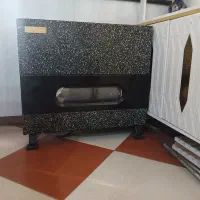 بخاری و آینه کنسول و پایه گلدون