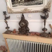 دو۶دد شمعدان وساعت فقط 3م