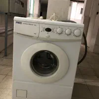 لباسشویی و اجاق گاز در حد نو سالم