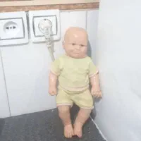عروسک اسباب بازی بچه ،