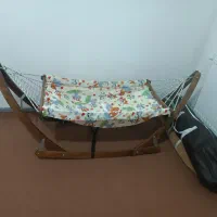 گهواره چوبی و برقی