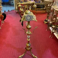تلفن کنار سالنی ماهی برنز