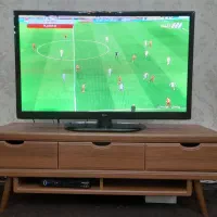 تلویزیون ۴۲ اینچ ال جی با میز و کارتن