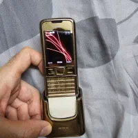 8800 آرت گلد به همراه پایه شارژ اصلی
