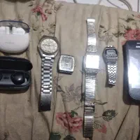 چهار عدد ساعت اورینت سیکو اماکس دو عدد هندزفری