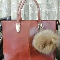 کیف چرم قهوه ایی عسلی