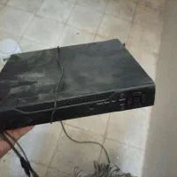 دوربین و مقداری لوازم مغازه