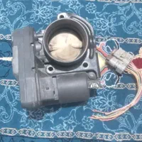 دریچه گاز برقی تیوفایو و اگزوز|قطعات یدکی و لوازم جانبی|سنندج, |دیوار