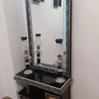آیینه و کنسول وشمعدان
