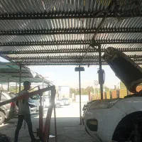 مکانیک .جلوبند.شاگرد .در مجتمع خودرو چینی