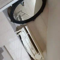 آینه و میز تلوزیون