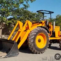 راننده تراکتور بیل عقب