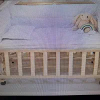 تخت کودک کنار مادر