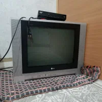 تلویزیون LG به همراه دستگاه دیجیتال