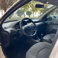 206 مدل آخر98 بی رنگ کم کار با برگه کارشناسی معتبر|خودرو سواری و وانت|کرج, شهرک احمدیه|دیوار