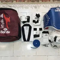لوازم تکواندو و کلاه و هوگو وکوله