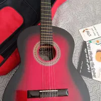 گیتار به همراه کتاب وکیف