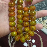 تسبیح کهربا پرچمی 33 عددی بو دار کار استاد یوسف