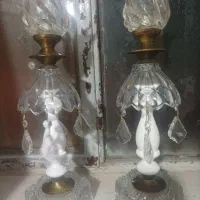 یک جفت شمعدان  بدون استفاده فقط دکور بوده وتمیز