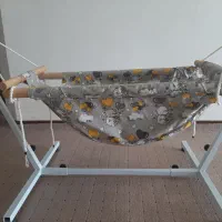 گهواره کودک کاملا سالم وکاربردی