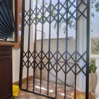 حفاظ اکاردونی ودرب چوبی