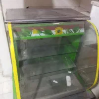 دخل و زیر ترازو مغازه ای