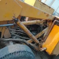 یک دستگاه بیل بکهو|ماشینآلات صنعتی|خمیر, |دیوار