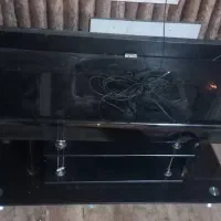 میز تلویزیون شیشه ایی مشکی در حد نو سالم