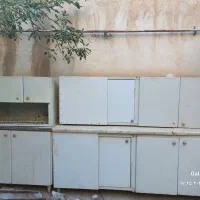 کابینت با سینک، پنجره، آجر و موزاییک