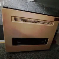 بخاری گازی ظریف سالم و تمیز با سینی زیرش