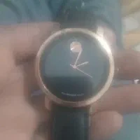 ساعت وگوشی ومقداری لوازم