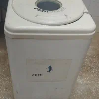 ماشین لباسشویی با جارو برقی