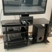 میز تلویزیون شیشه‌ای