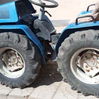 تراکتور کمر شکن 938