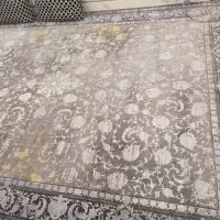 فرش ۱۲ متری و ساعت برنز