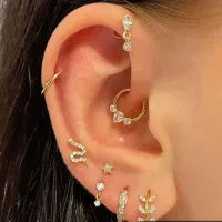 سوراخ گوش نوزاد بزرگسال چال گونه پیرسینگ مطب پزشک