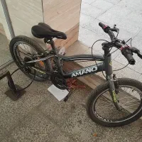دوچرخه ۲۰ مارک آمانو دنده دارحرفه ای در حد نو سالم