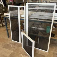 تولید کننده انواع توری های پلیسه وثابت آلومینیومی