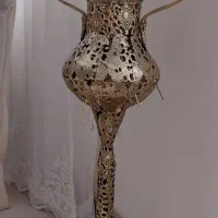 گلدان و کنار سالنی برنزی