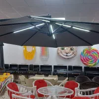 چتر پایه کنار سایه بان چراغ دار باغ ویلا روفگاردن|مصالح و تجهیزات ساختمان|چهارباغ, |دیوار