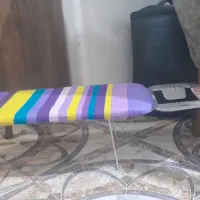 میز اتو نشسته