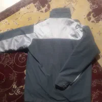 کاپشن نگهبانی اصلی|لباس|گلبهار, شهر جدید گلبهار|دیوار