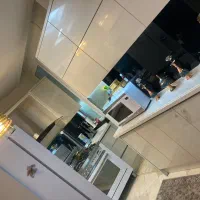 100-متر-ریحانی-جنوبی-سالن-پرده-خور-کم-واحد