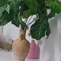 گل مصنوعی وگلدان سفالی کوزه