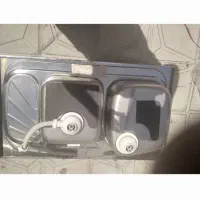 فروش آبگرمکن و سینک دوقلو و تابلو در مغازه