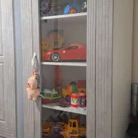 تخت و کمد اسباب بازی کودک همراه با لوستر و ساعت